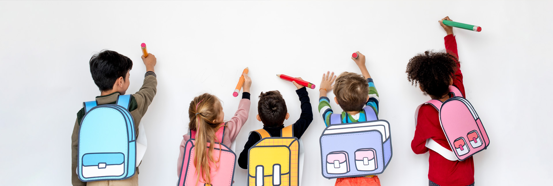5 young school kids with hand drawn bags